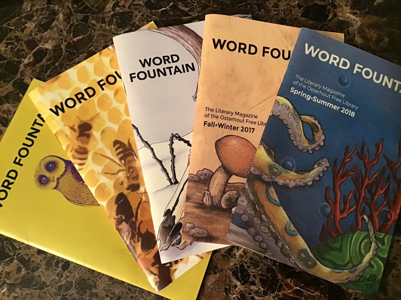 Various covers of Word Fountain Magazine